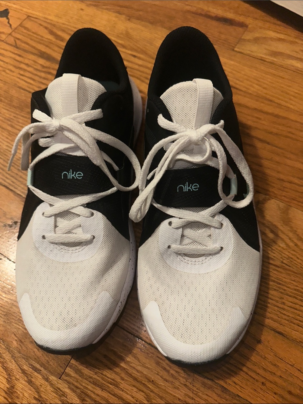Nike Woman’s  Black and White Athletic Sneakers